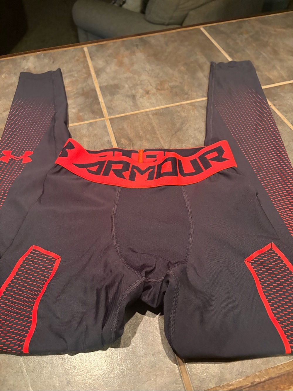 Under Armour Men’s Black Compression Pants with Red Accents